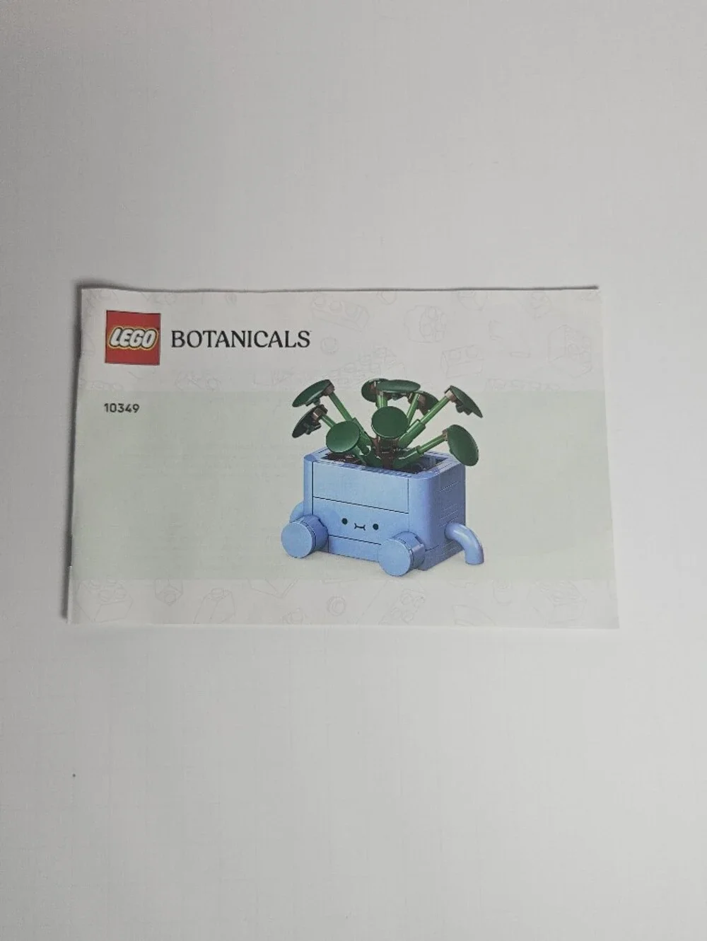 Blue LEGO Botanicals Happy Plants building set number 10349 BOOK ONLY